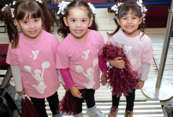 Westpark YMCA Cheerleaders, that includes three Latin’s girls, performed a dance at the Q